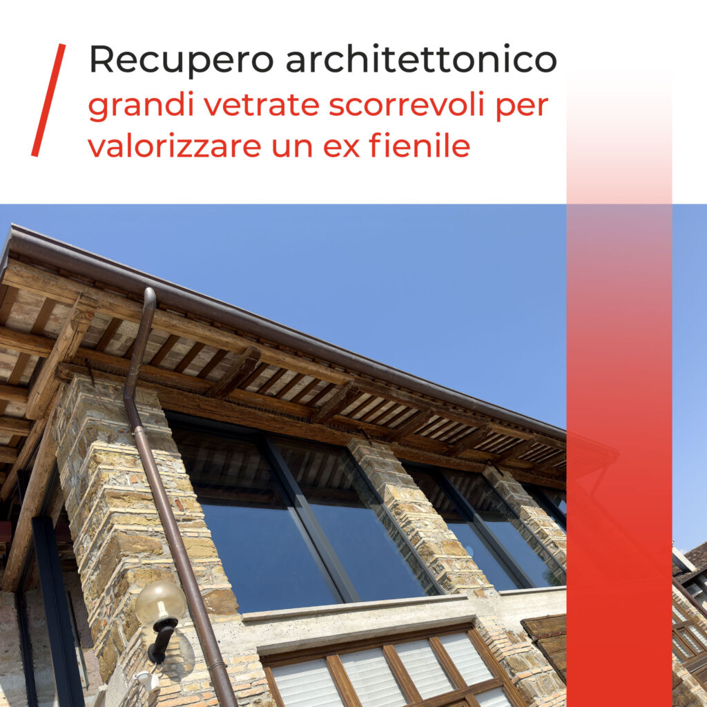 Recupero architettonico: grandi vetrate scorrevoli per valorizzare un ex fienile